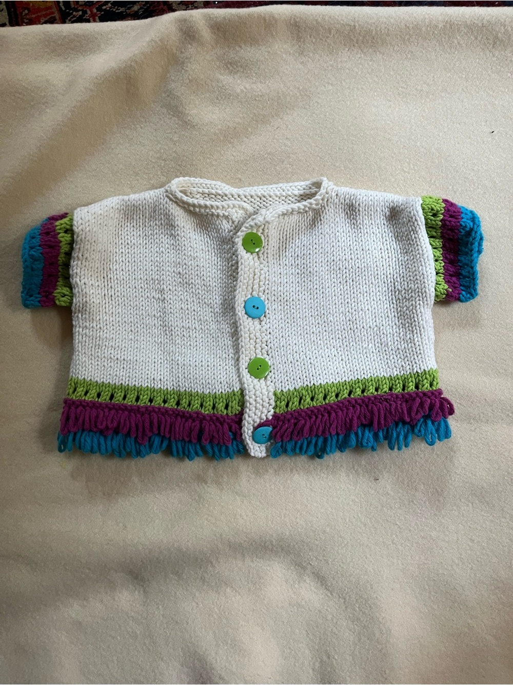 Handmade White Knit Baby Cardigan with Colorful Trim